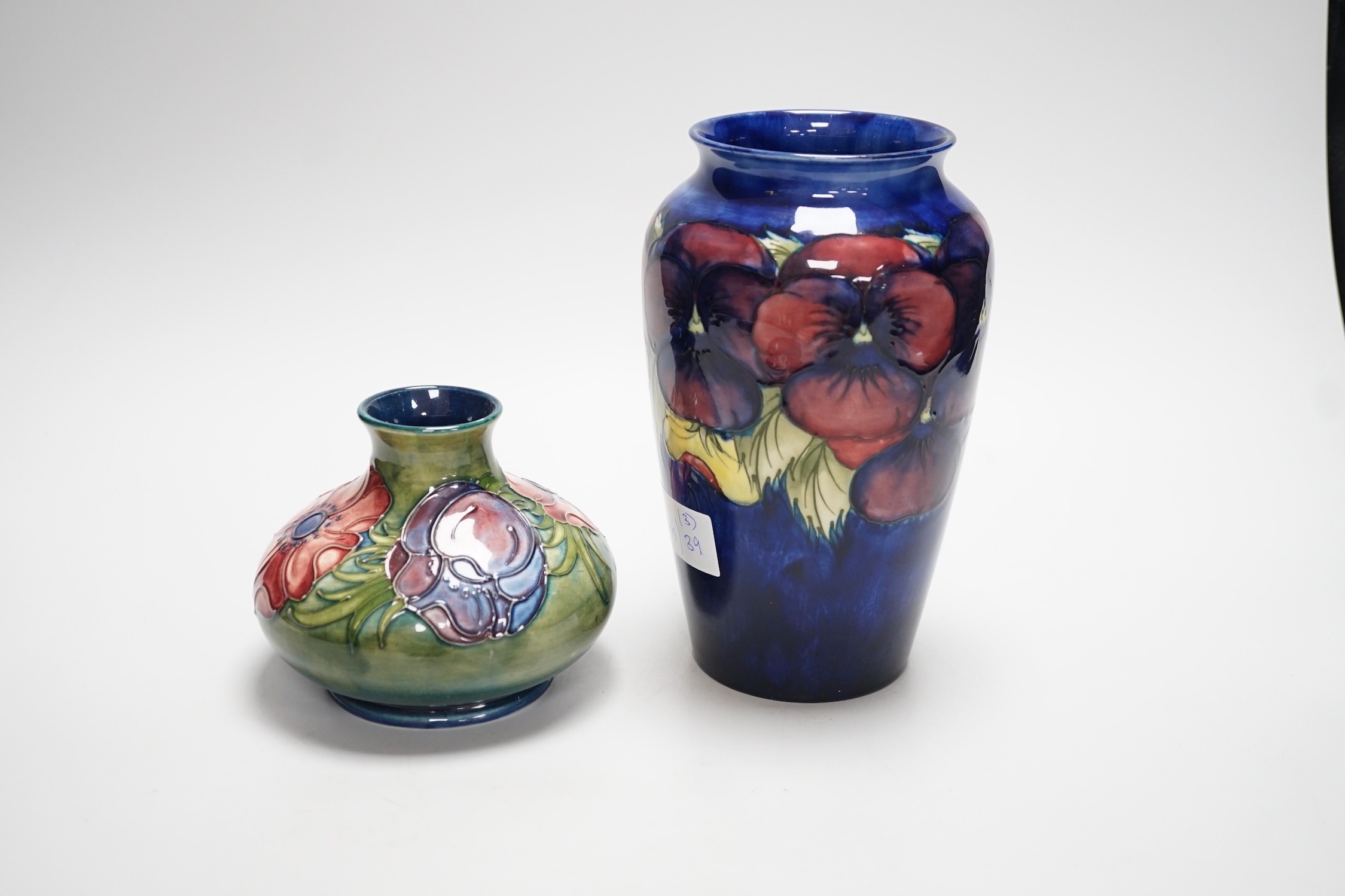 Two Moorcroft vases and a dish, tallest 20cm